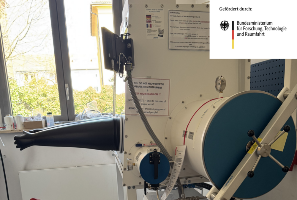 The image shows the glovebox system from the side.